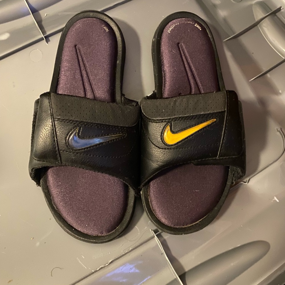 Nike brand shoes and slides